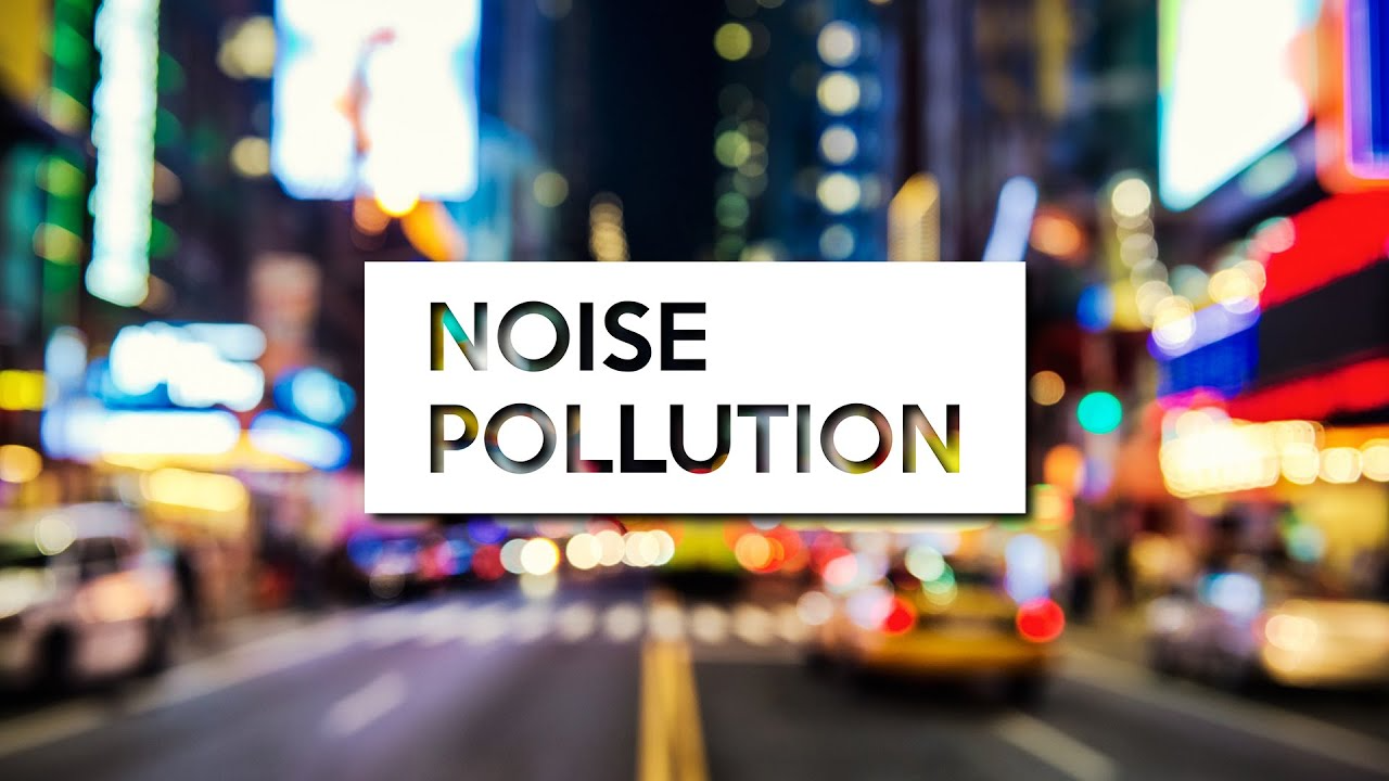 A blurred city street scene with bright lights and taxis; bold text overlay reads "Noise Pollution."
