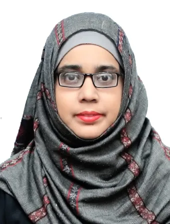 Dr. Saima Rizwan wears a dark-colored hijab with a patterned gray scarf, showcasing intricate designs and layered fabric.