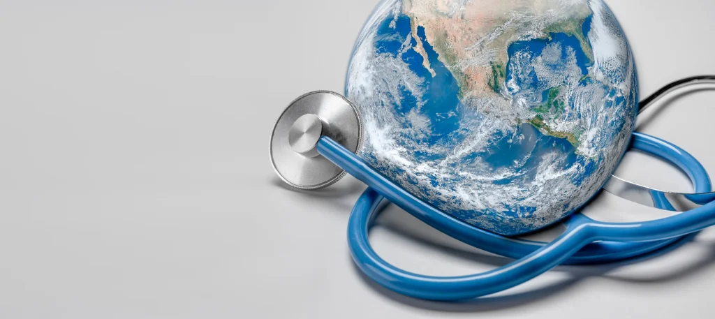 A stethoscope envelops a globe, symbolizing global health and wellness interconnected with the Earth.