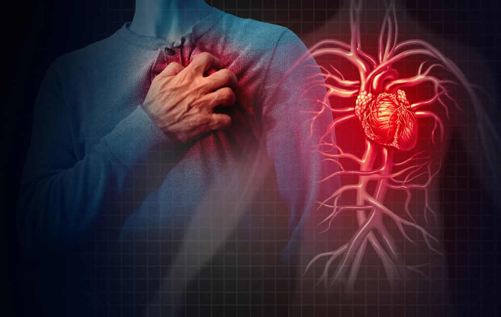 Person clutching their chest in distress, with a heart and blood vessel illustration — showing early signs of heart disease.